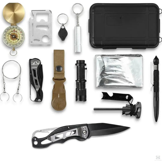 Collection of survival tools including a knife, flashlight, and compass on a white background